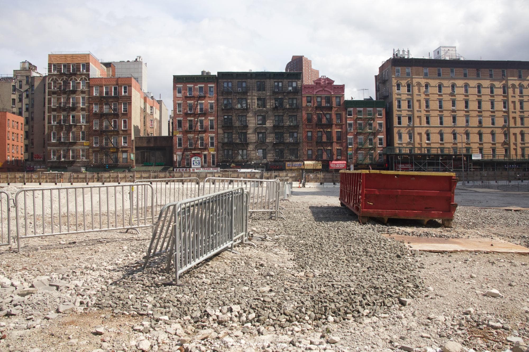 A precarious promise: What the tallest jail in the world means for those who live next to it